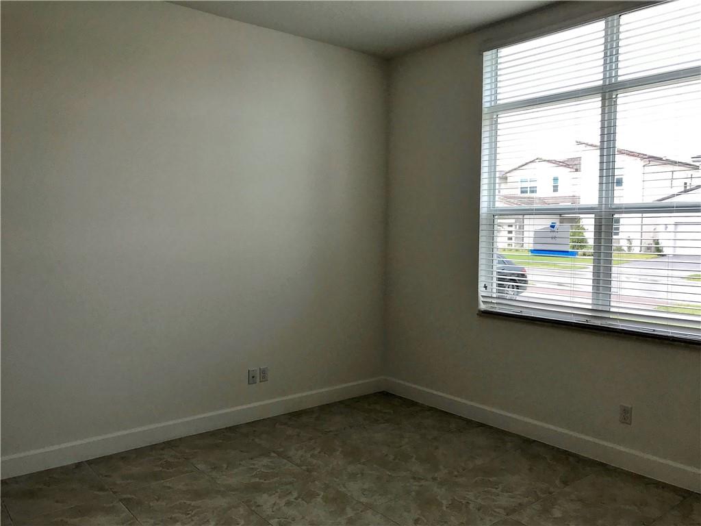 5208 Beland Drive Lake Worth, FL 33467 - Photo 16 of 21 an empty room with a window