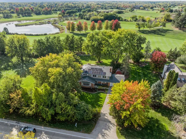 a view of lake with green space