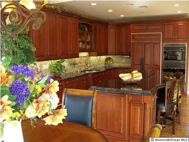 32 Mine Brook Road Colts Neck, NJ 07722 - Photo 3 of 3 a kitchen with a sink and cabinets