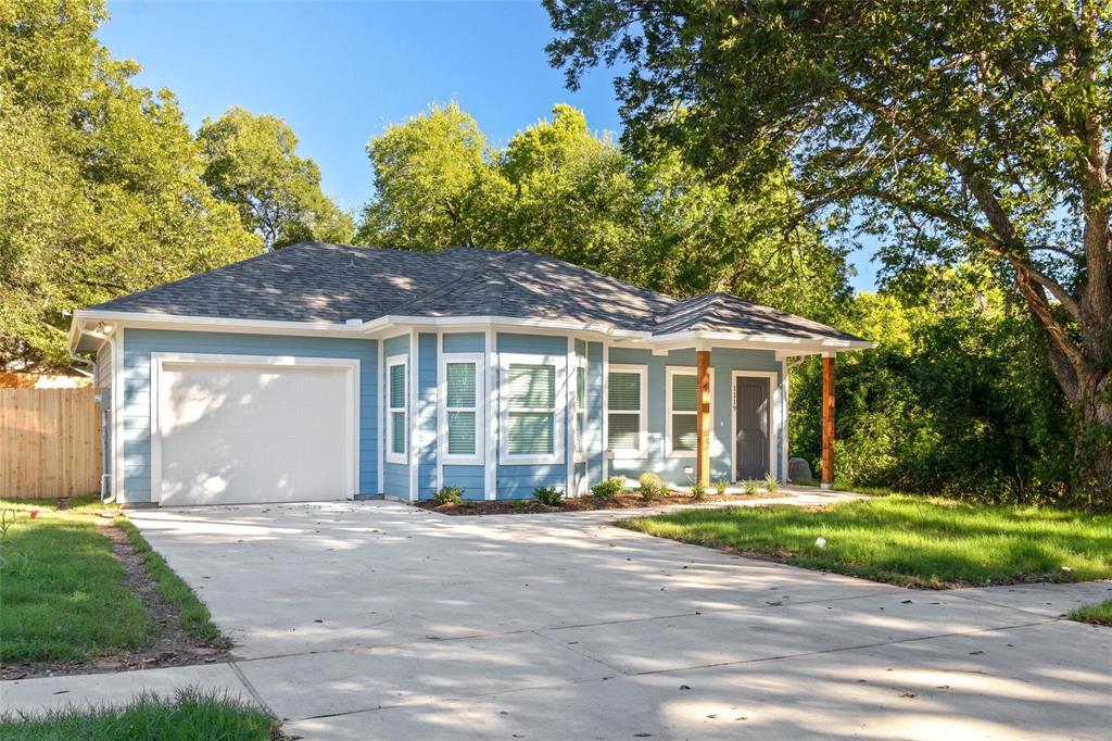 1119 East Epstein Street Sherman, TX 75090 - Photo 2 of 13 a front view of a house with a yard