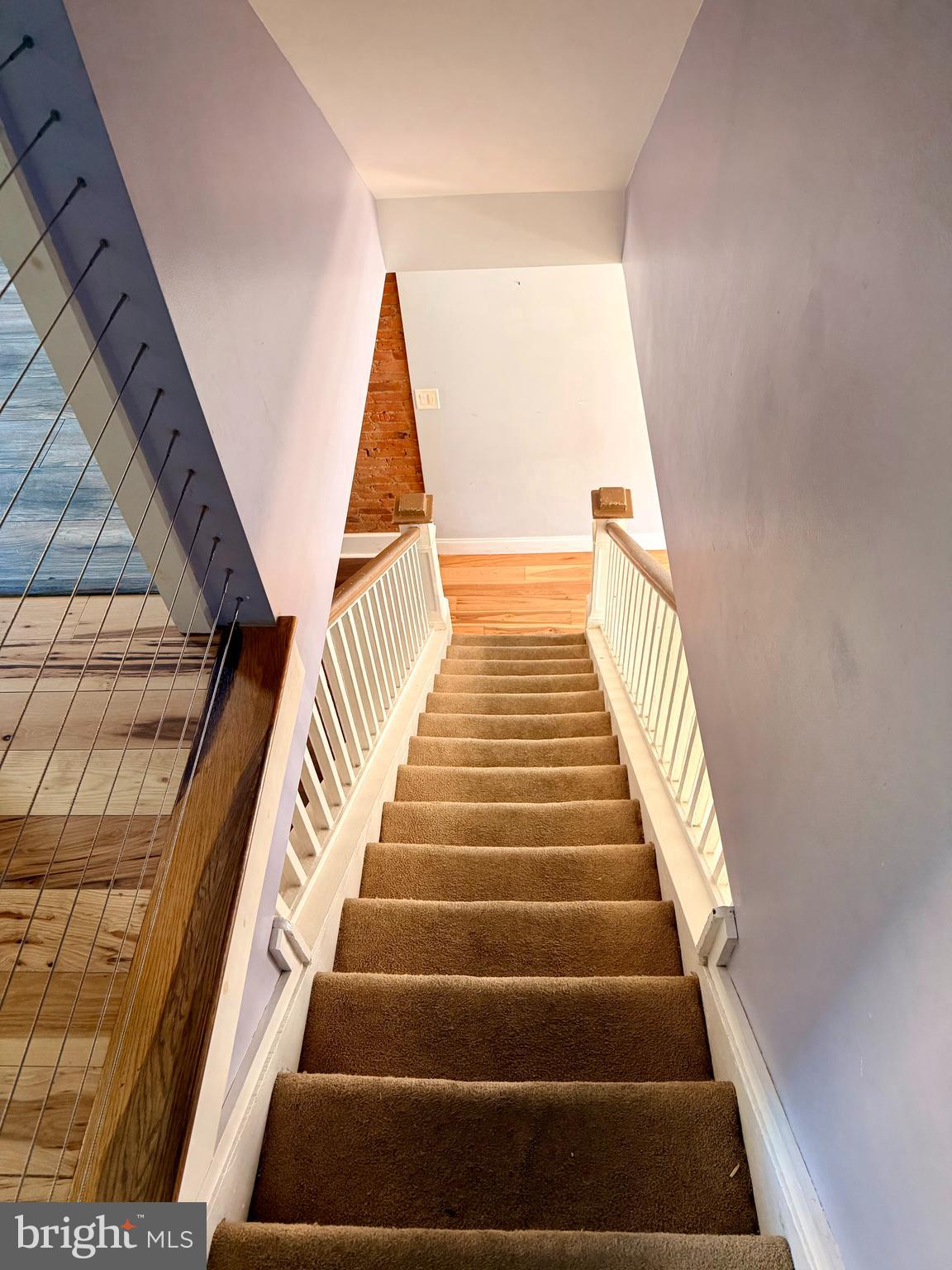 1944 Palethorp Street Philadelphia, PA 19122 - Photo 7 of 14 Carpeted stairs with updates
