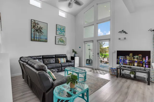 a living room with furniture and a rug