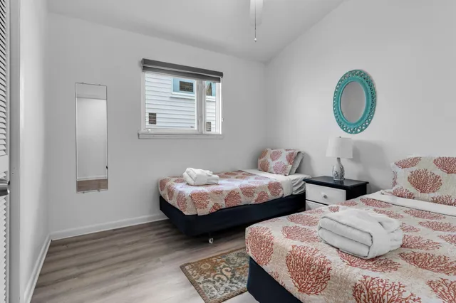 a bedroom with bed and a window