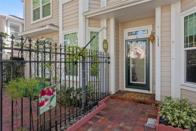 a kitchen with stainless steel appliances granite countertop a stove sink and microwave