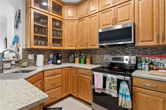 a living room with furniture a air conditioner and a mirror