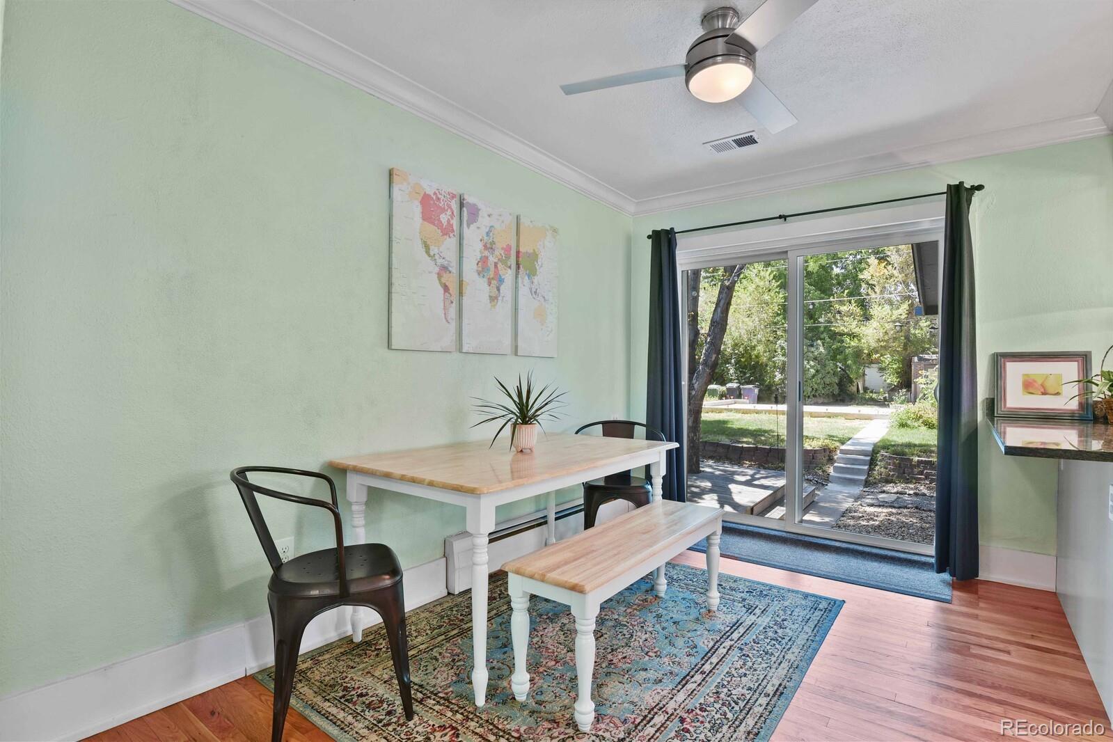 3615 Lowell Boulevard Denver, CO 80211 - Photo 4 of 23 a view of a livingroom with furniture wooden floor and a rug