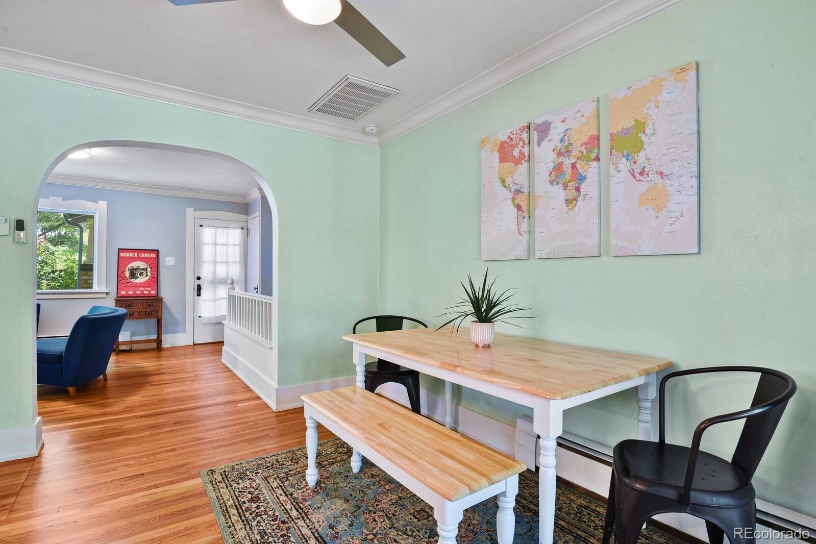 3615 Lowell Boulevard Denver, CO 80211 - Photo 5 of 23 a view of a dining room with furniture and wooden floor