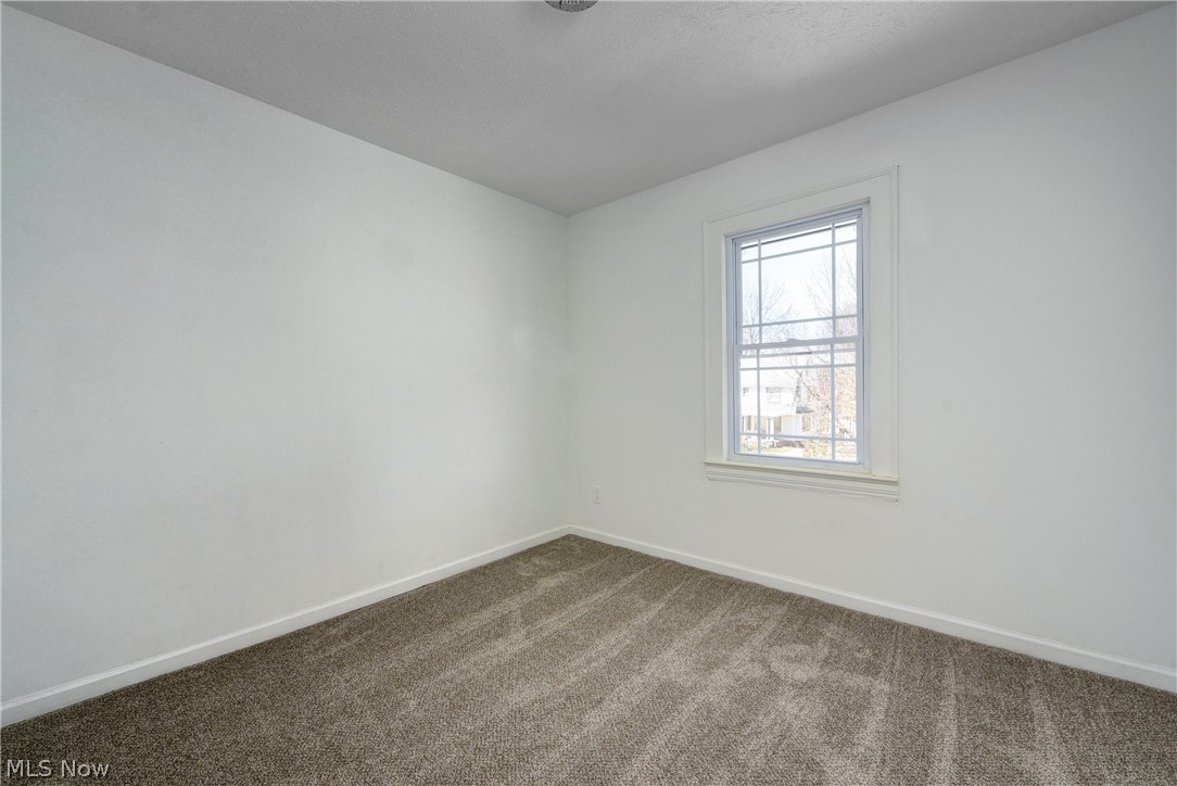 3164 Whitethorn Road Cleveland, OH 44118 - Photo 23 of 31 Spare room with carpet floors