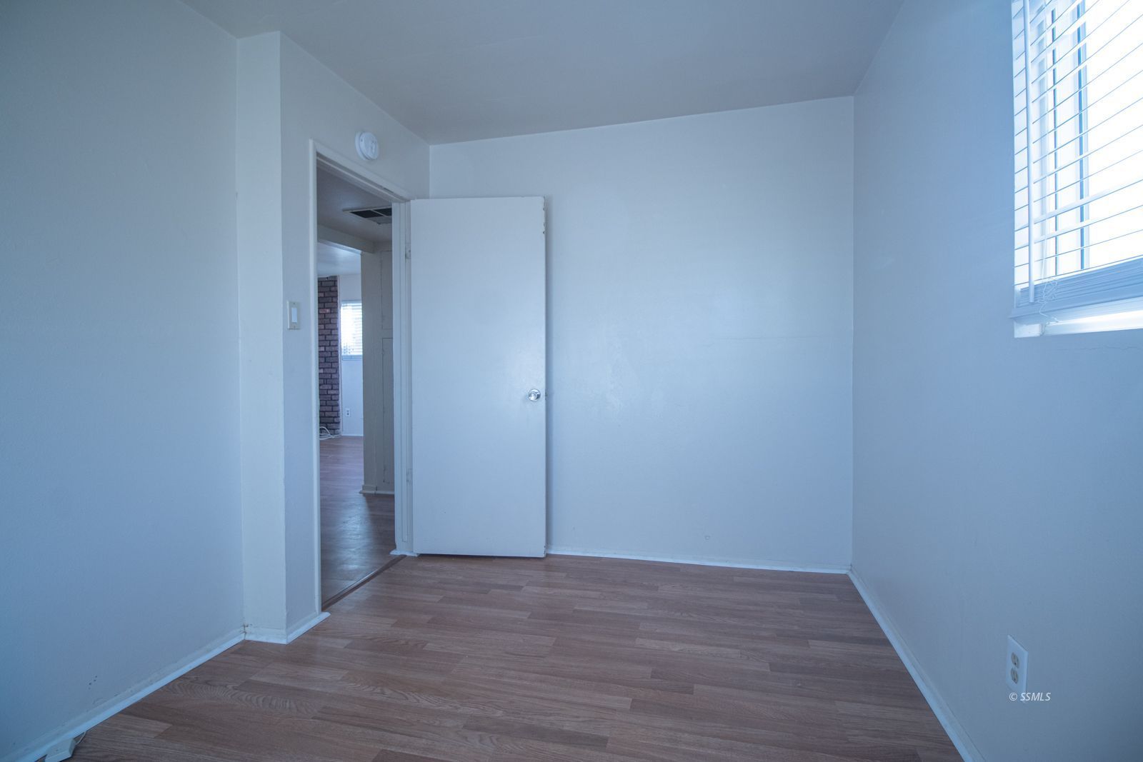 1621 Sims Street Ridgecrest, CA 93555 - Photo 17 of 24 wooden floor in an empty room