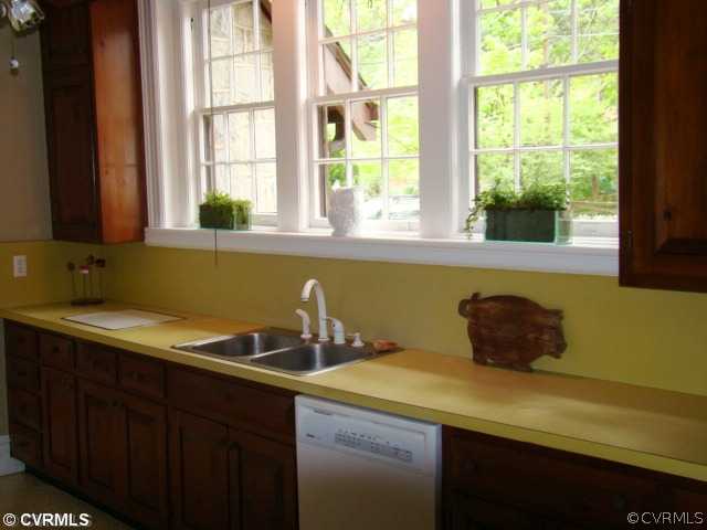 4515 Butte Road Richmond, VA 23235 - Photo 14 of 15 a bathroom with a sink and a window