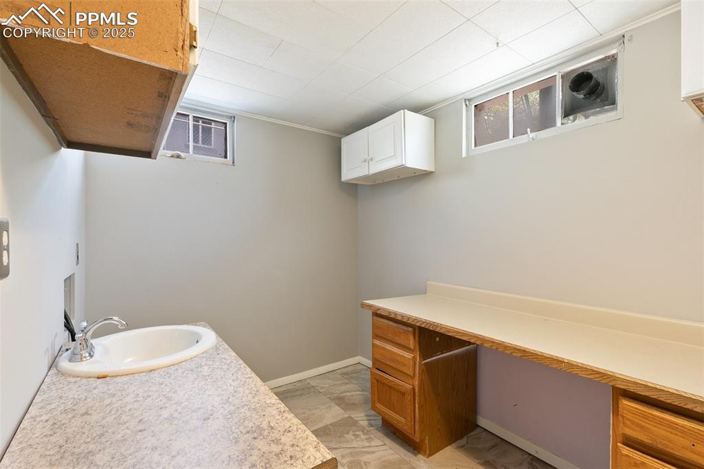 623 Swope Avenue Colorado Springs, CO 80909 - Photo 18 of 39 a room with table and chair