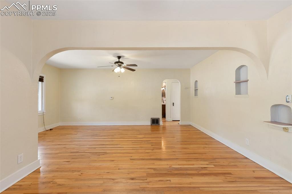 623 Swope Avenue Colorado Springs, CO 80909 - Photo 6 of 39 a view of an empty room with a window