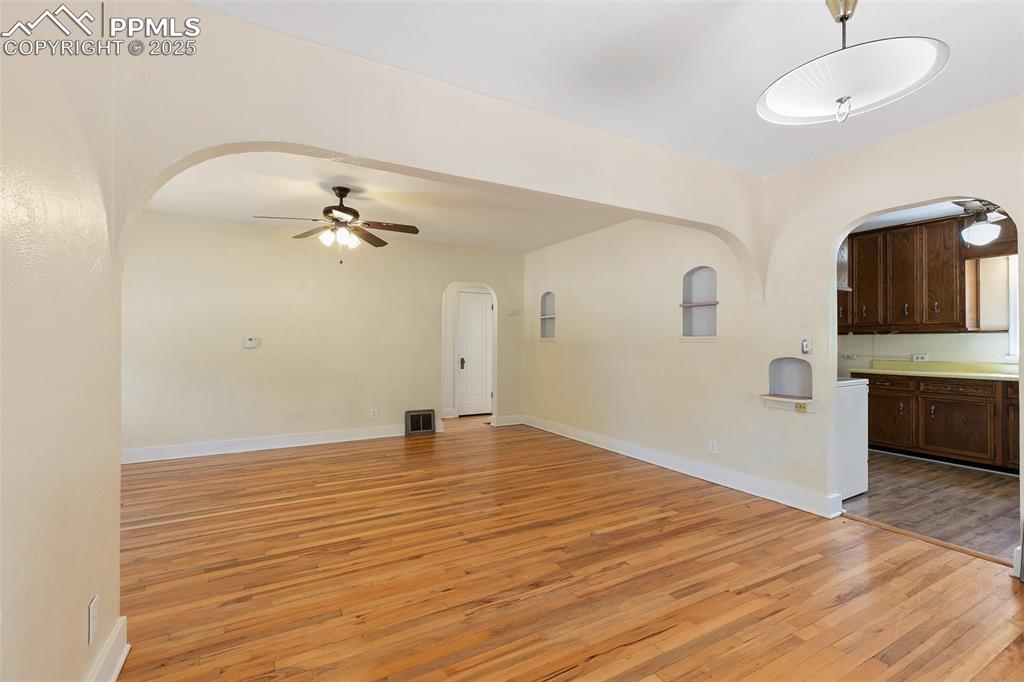 623 Swope Avenue Colorado Springs, CO 80909 - Photo 10 of 39 a view of an empty room with a sink and a mirror