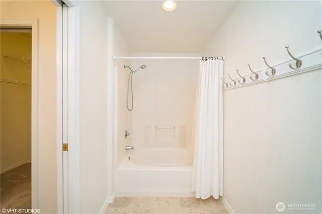 a bathroom with a bathtub
