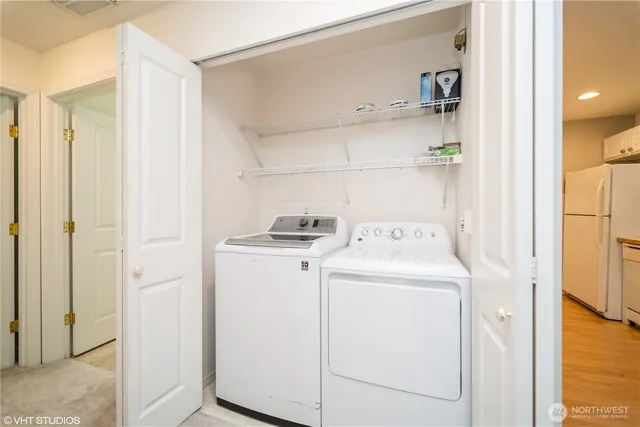a utility room with dryer and washer