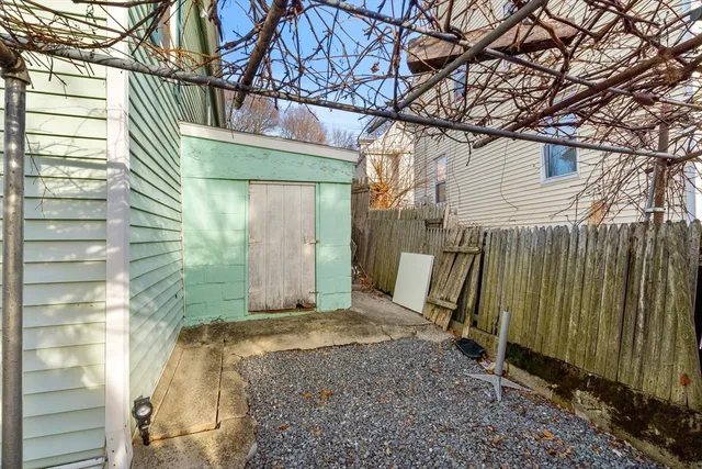 a view of a back yard of the house