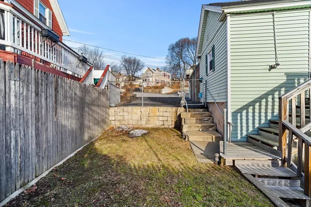 a view of balcony with wooden floor