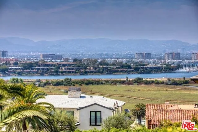 a view of a lake with a mountain