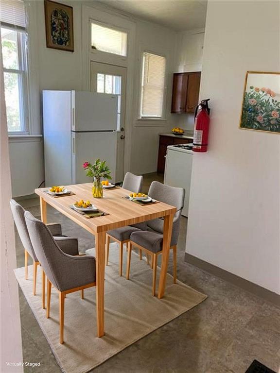 243 South Chestnut Street Pittsburgh, PA 15202 - Photo 13 of 19 a dining room with a wooden table and chairs