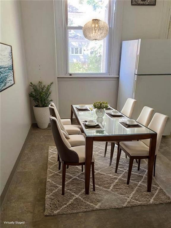 243 South Chestnut Street Pittsburgh, PA 15202 - Photo 15 of 19 a view of a dining room with furniture window and wooden floor