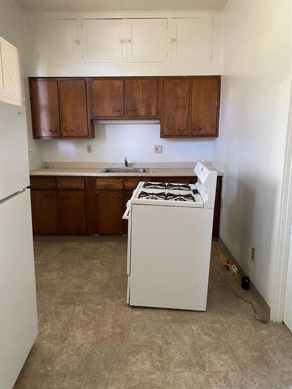 243 South Chestnut Street Pittsburgh, PA 15202 - Photo 19 of 19 a kitchen with stainless steel appliances granite countertop a stove a sink and a microwave