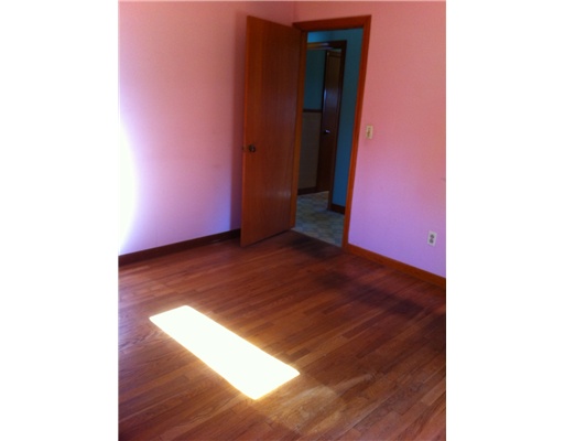 6 Asylum Road Warren, RI 02885 - Photo 6 of 6 Bedroom. ONE OIF TWO FIRST FLOOR BEDROOMS PERFECT FOR OFFICE OR DEN.