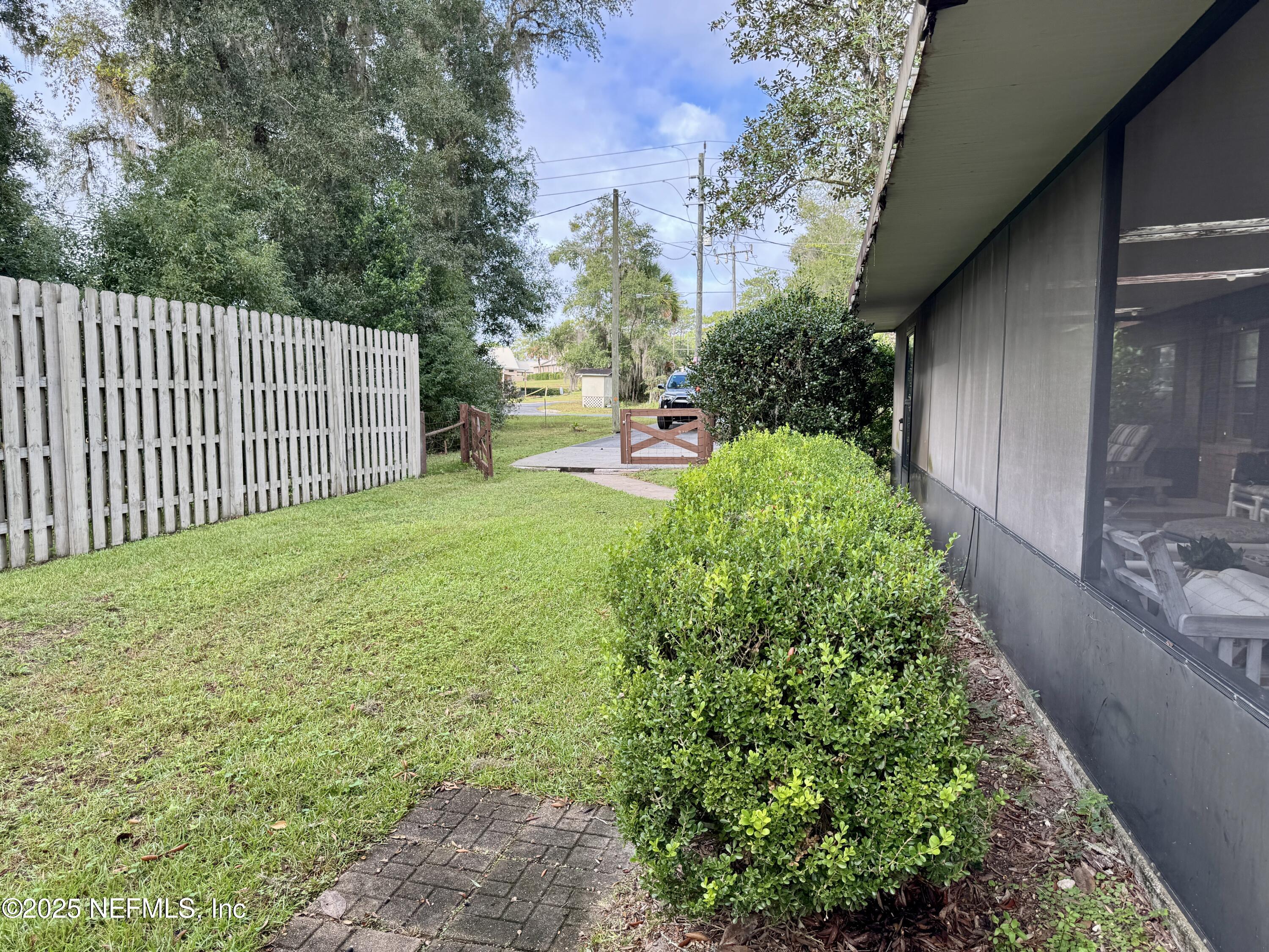 116 Francis Street Interlachen, FL 32148 - Photo 11 of 45 a view of a backyard with pathway