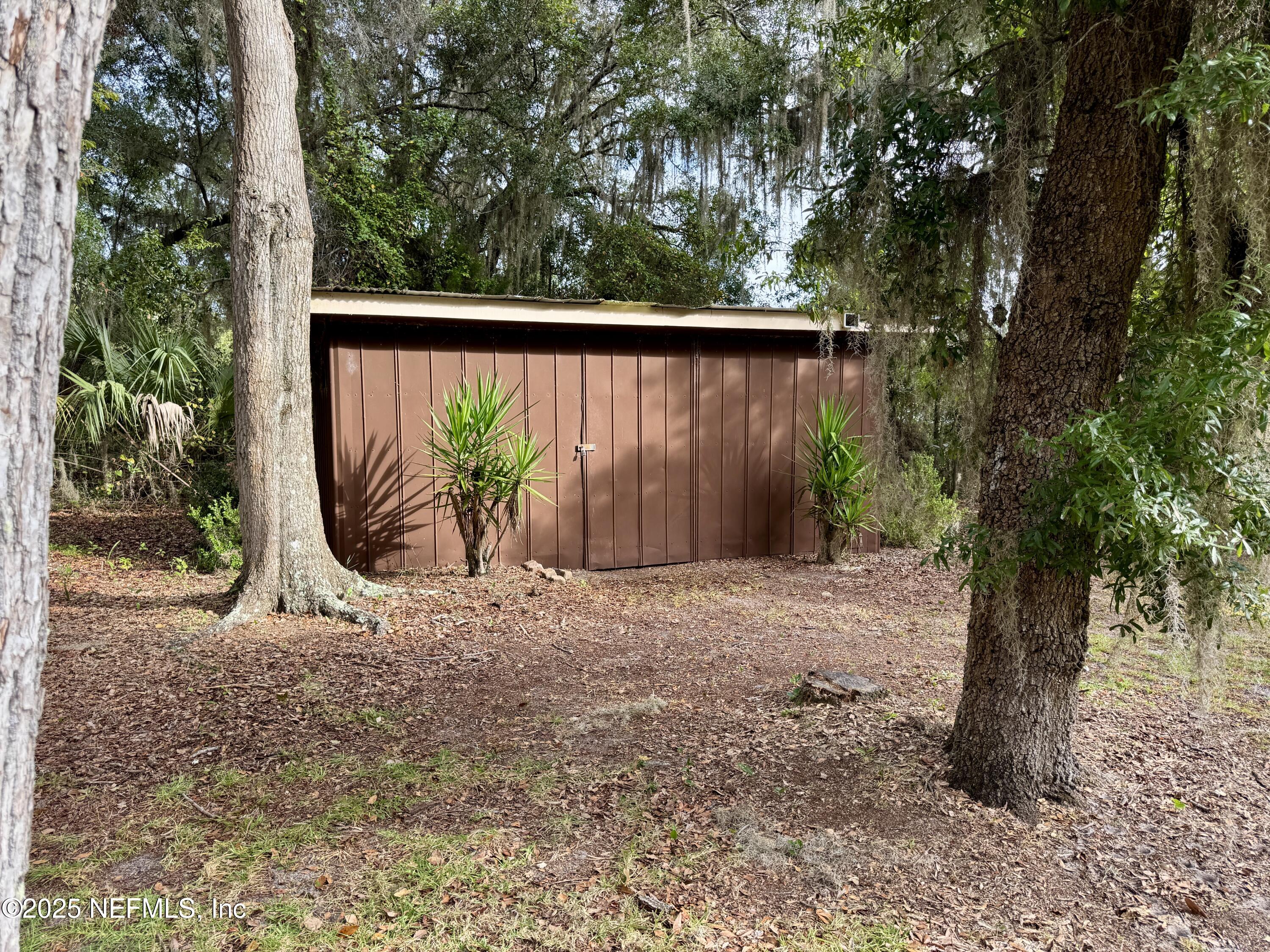 116 Francis Street Interlachen, FL 32148 - Photo 14 of 45 a backyard of a house with lots of green space