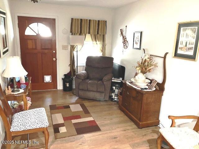 116 Francis Street Interlachen, FL 32148 - Photo 18 of 45 a living room with furniture and wooden floor