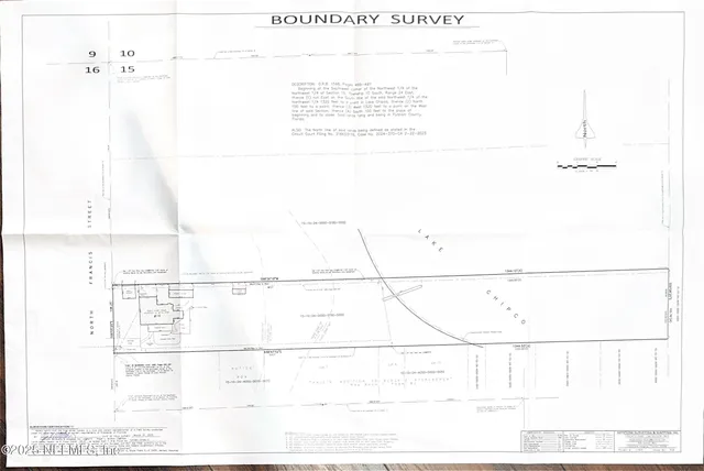 a view of a lake in middle of forest