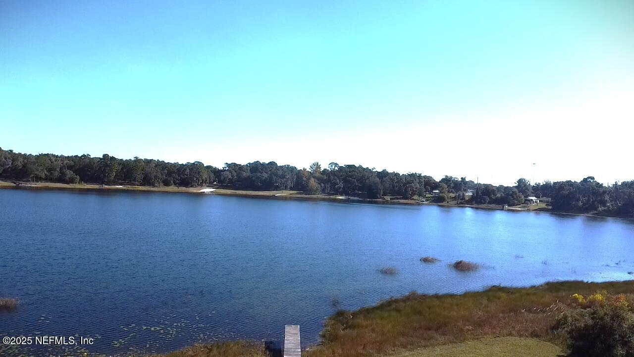 116 Francis Street Interlachen, FL 32148 - Photo 38 of 45 a view of a lake in middle of forest