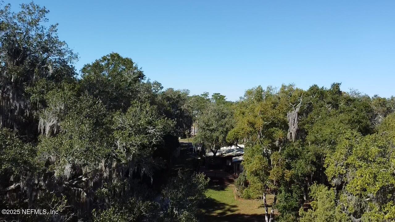116 Francis Street Interlachen, FL 32148 - Photo 39 of 45 a view of a city with lush green forest