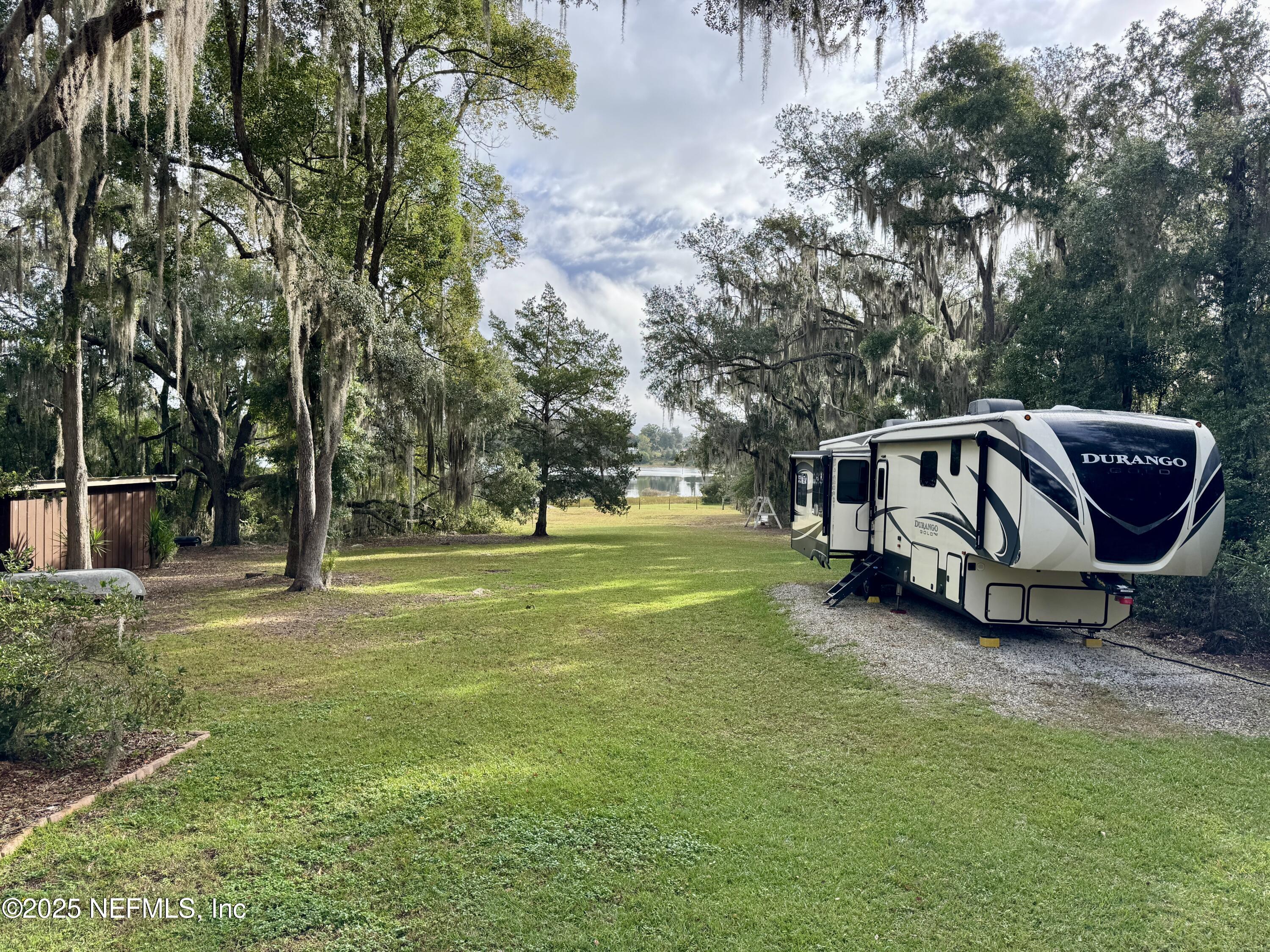 116 Francis Street Interlachen, FL 32148 - Photo 6 of 45 a view of a house with a yard