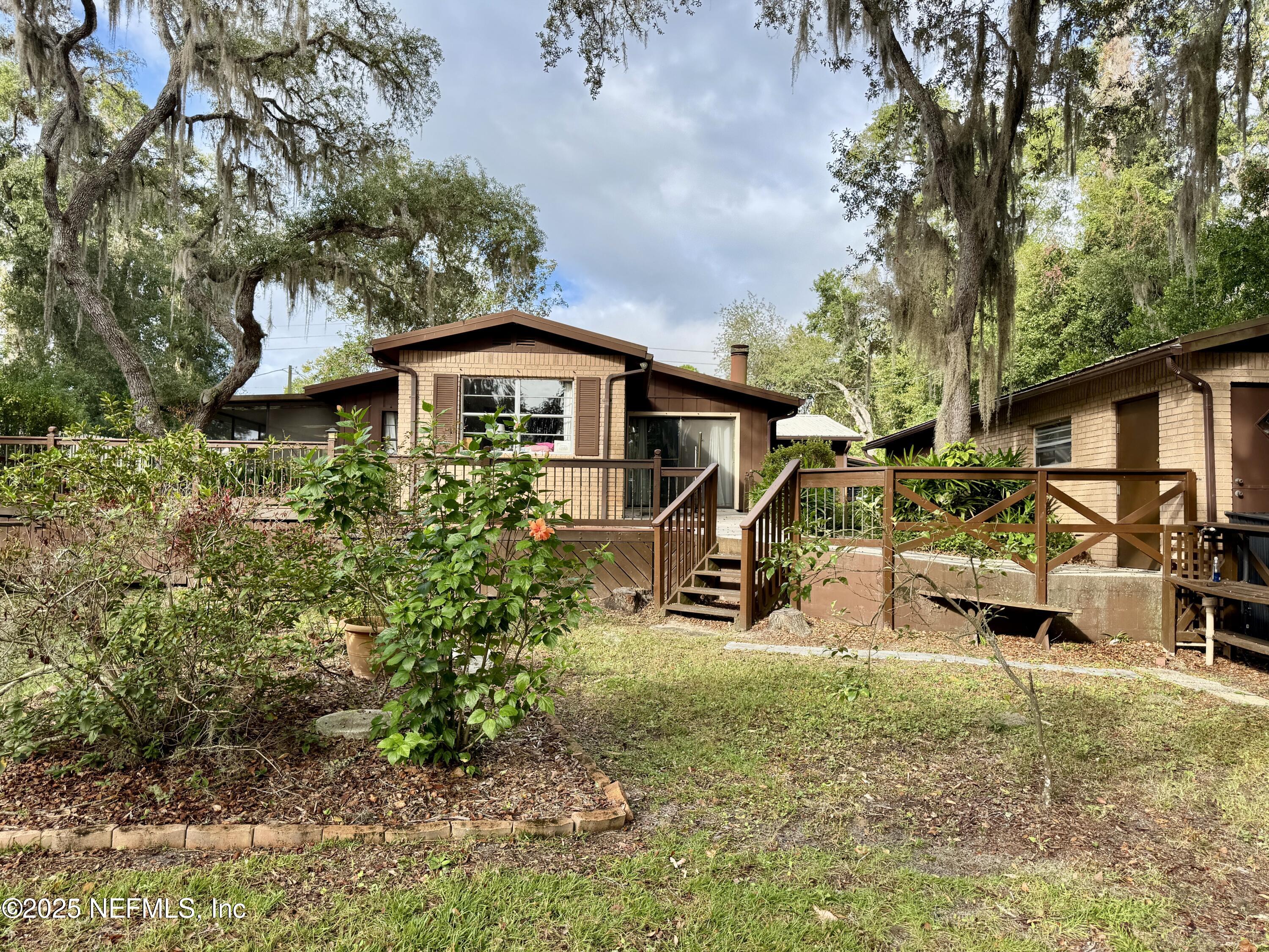 116 Francis Street Interlachen, FL 32148 - Photo 8 of 45 a view of a house with a yard