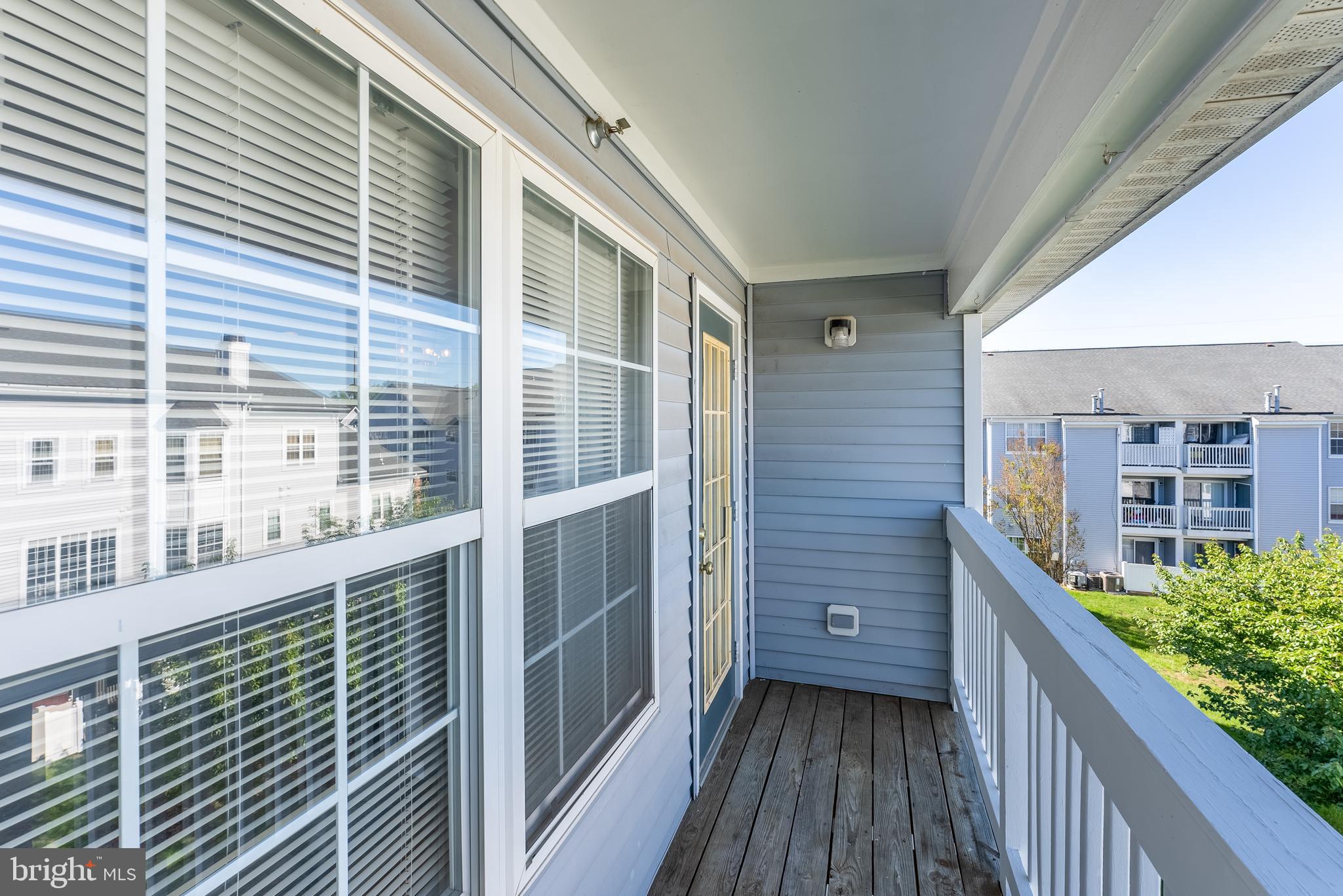 645 Constellation Square Southeast, Unit L Leesburg, VA 20175 - Photo 34 of 44 a view of balcony with a deck