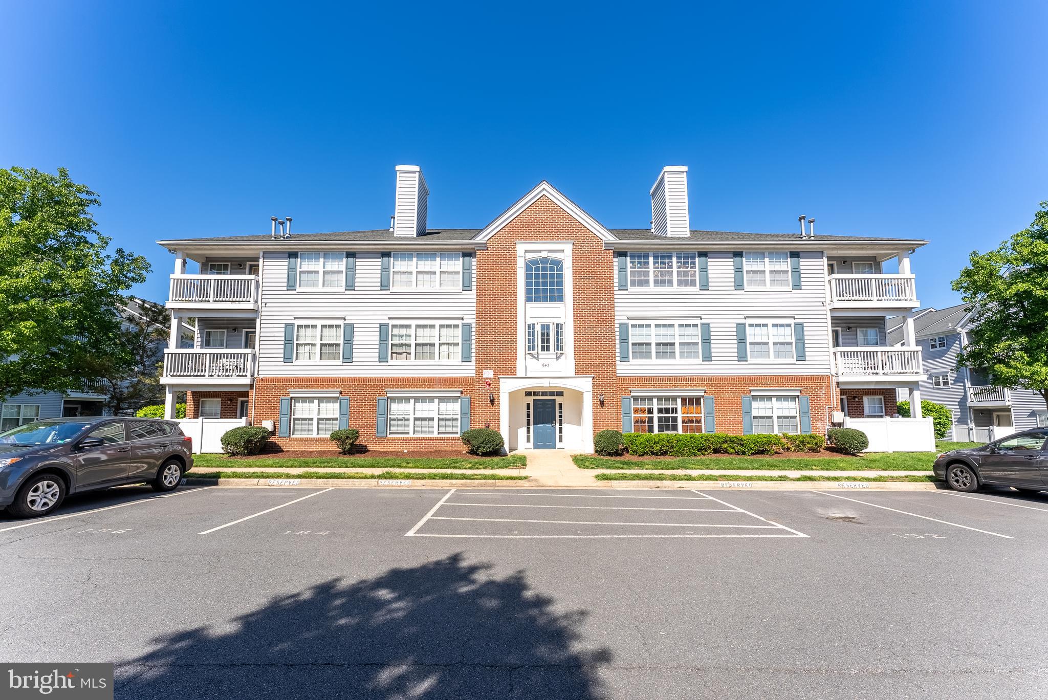 645 Constellation Square Southeast, Unit L Leesburg, VA 20175 - Photo 7 of 44 a front view of a building with street view