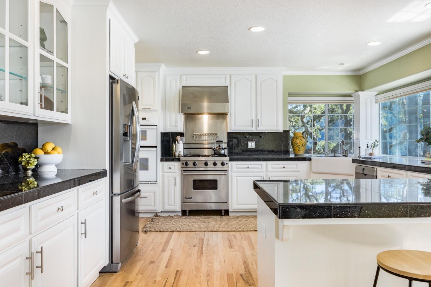 348 Los Robles Road Soquel, CA 95073 - Photo 15 of 87 a kitchen with stainless steel appliances granite countertop a stove a sink and a refrigerator