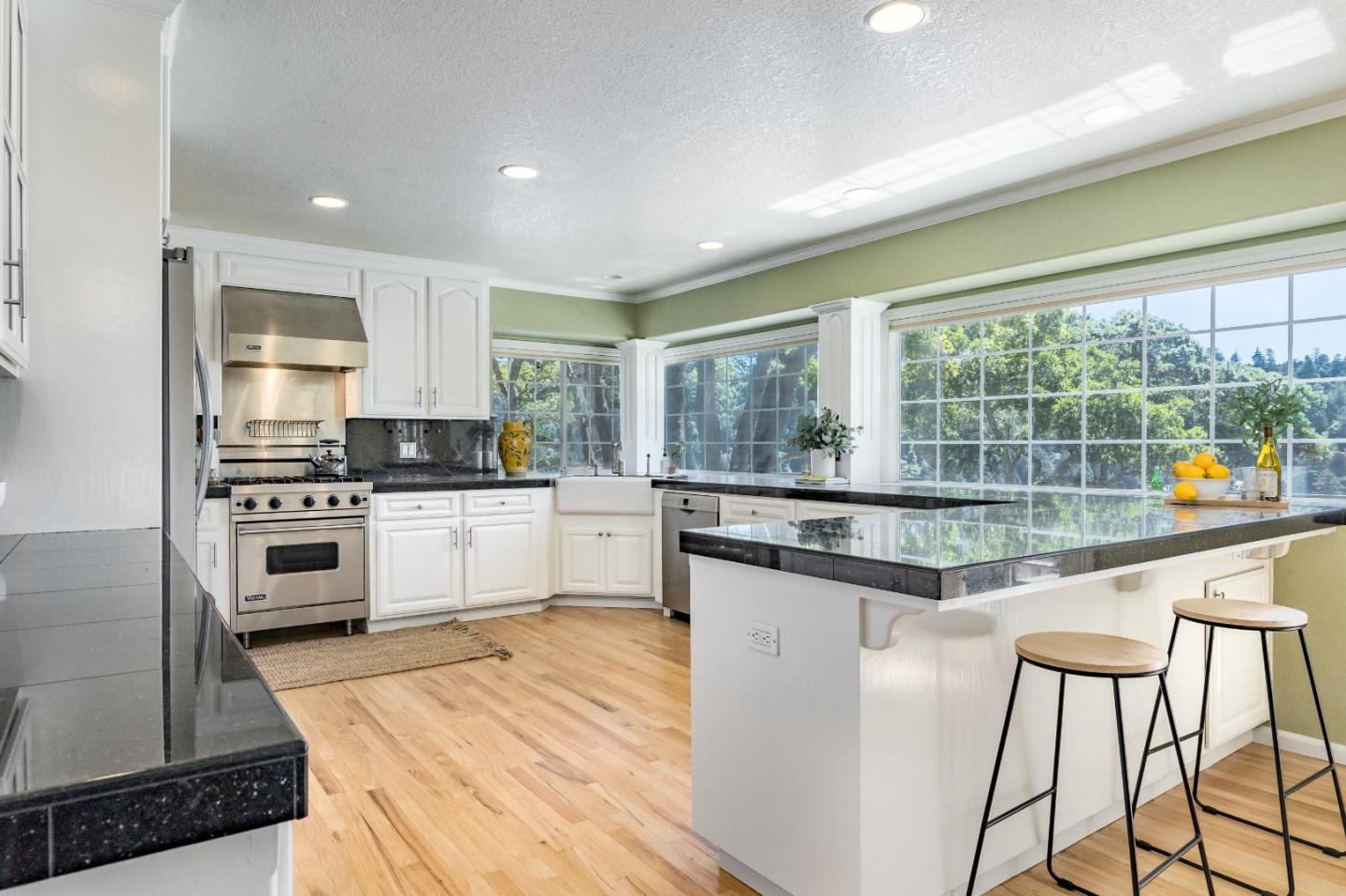 348 Los Robles Road Soquel, CA 95073 - Photo 17 of 87 a kitchen with granite countertop white cabinets and appliances