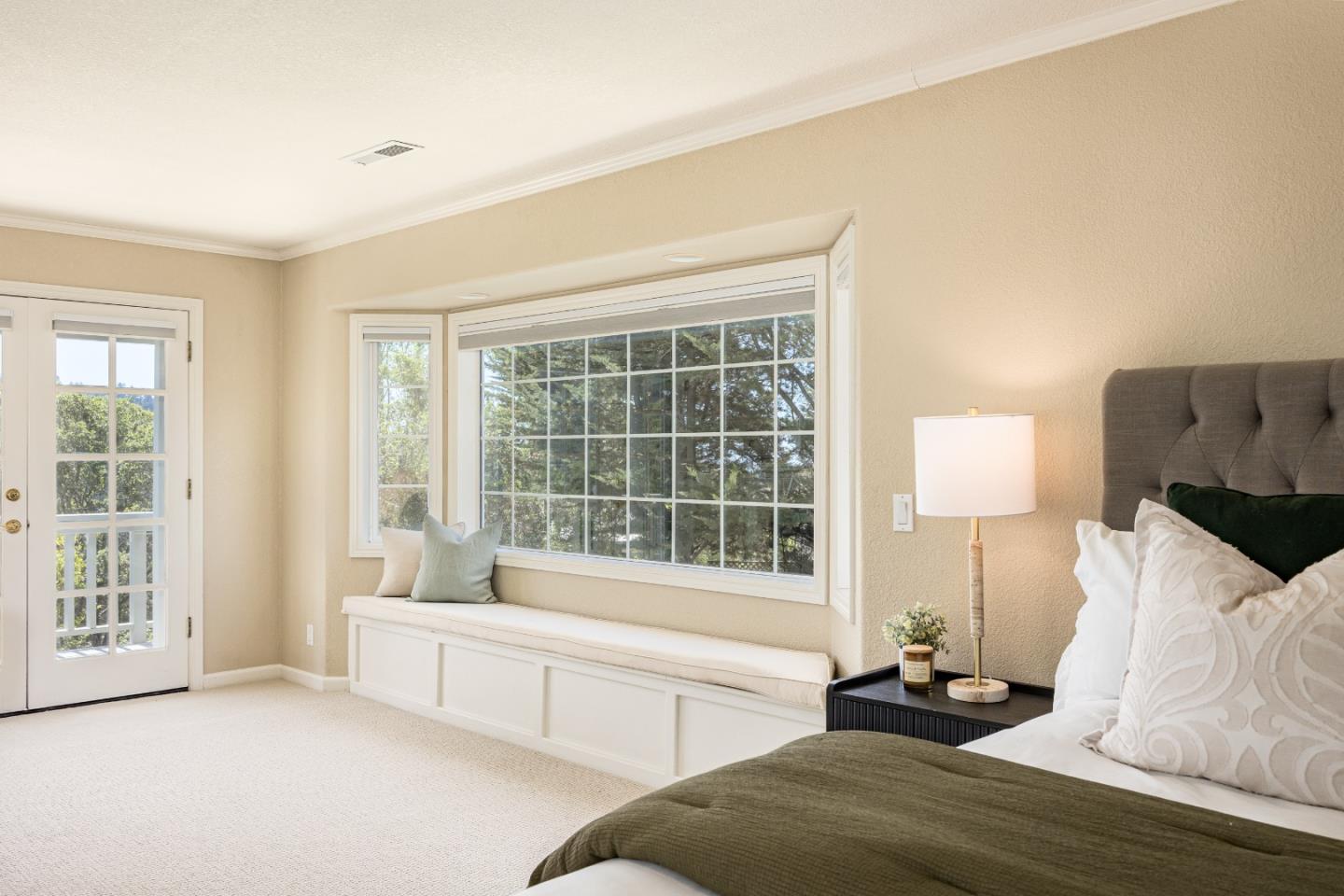 348 Los Robles Road Soquel, CA 95073 - Photo 24 of 87 a spacious bedroom with a bed and a large window
