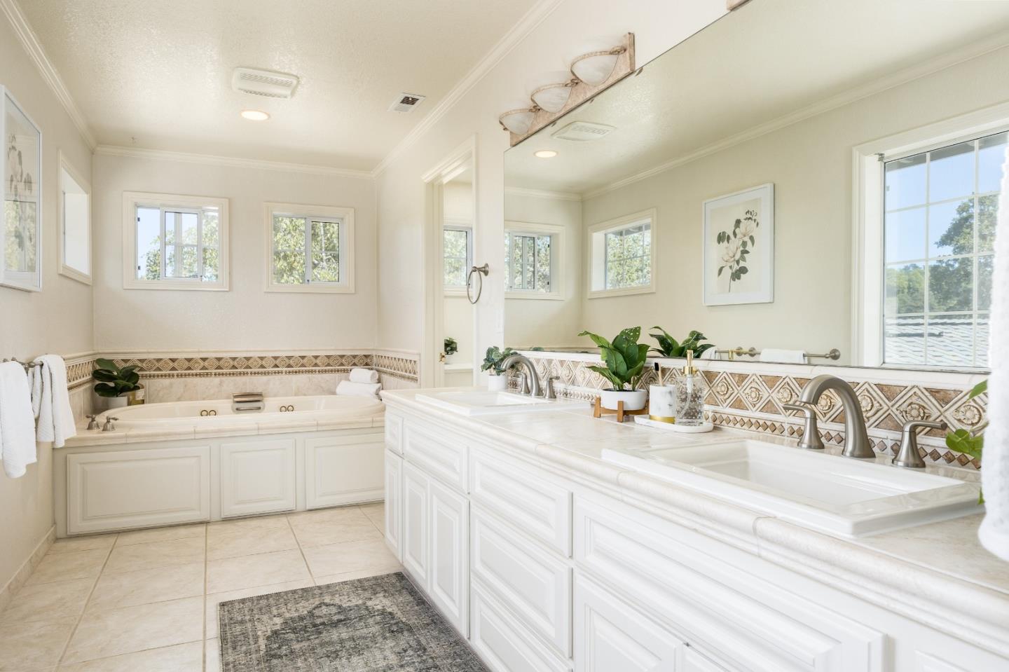 348 Los Robles Road Soquel, CA 95073 - Photo 25 of 87 a spacious bathroom with a tub sink and mirror