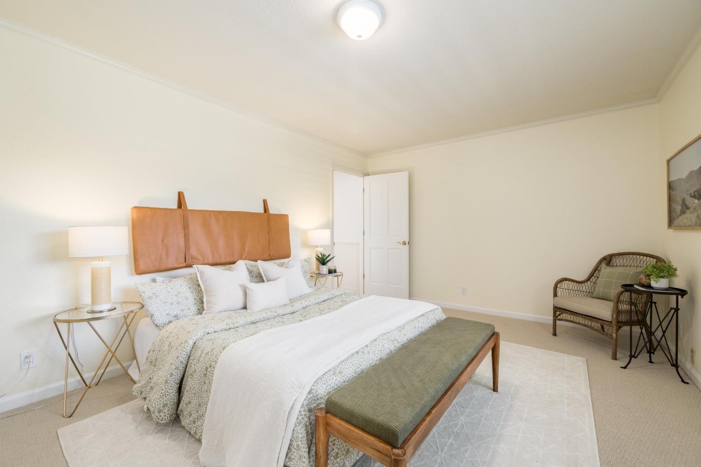 348 Los Robles Road Soquel, CA 95073 - Photo 31 of 87 a bedroom with a bed and a chair