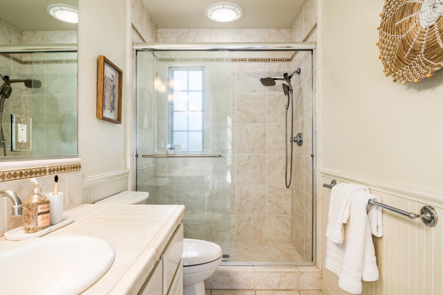 348 Los Robles Road Soquel, CA 95073 - Photo 33 of 87 a bathroom with a sink a toilet and shower
