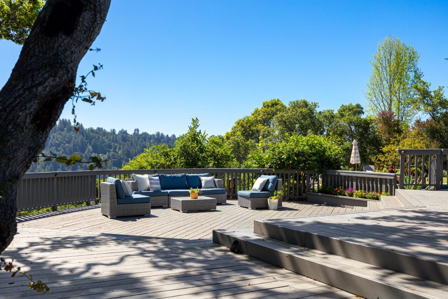 348 Los Robles Road Soquel, CA 95073 - Photo 43 of 87 a view of a patio with couches plants and city view