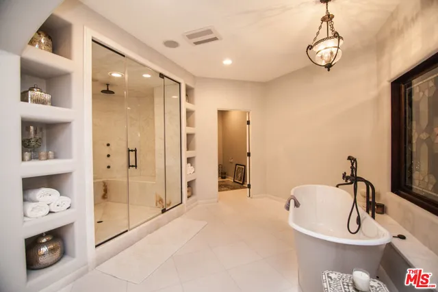 a bathroom with a sink and a shower