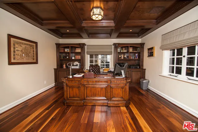 a view of a room with wooden floors and lots of wooden floors