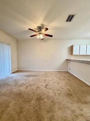 a view of a big room with an empty space