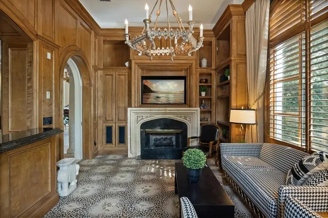 a kitchen with a sink a counter top space and stainless steel appliances