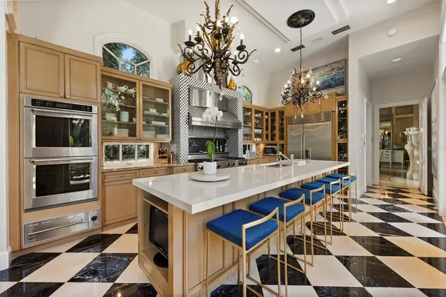 a spacious bedroom with a bed and a fireplace