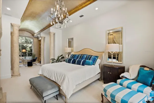 a view of a room with door and wooden floor