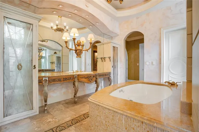 a view of a patio with table and chairs and potted plants